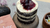 Chocolate Mud Cake with Sour Cream Frosting and Cherry Compote